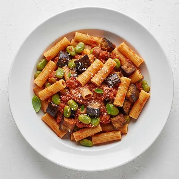 Sicilian Style Roasted Eggplant, Fava Beans And Basil Tomato Sauce With Rigatoni